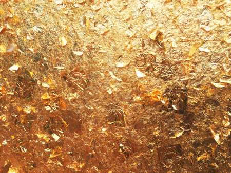 Texture of the gold leaf, Gold background, Picture from Buddha image Back.