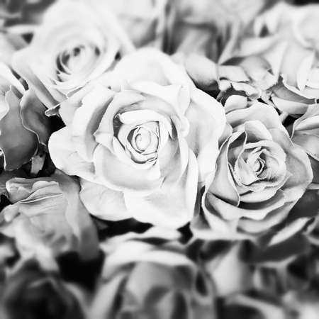 Fake roses,Plastic roses - Lot of artificial flowers.の写真素材