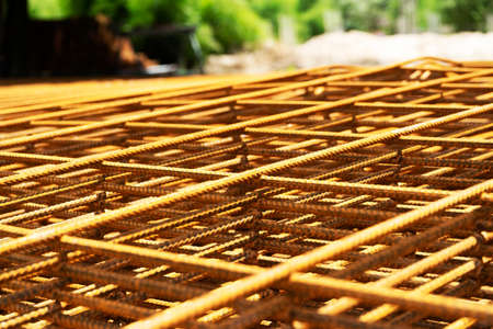 Rusty metal armature net for building construction.