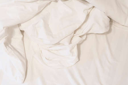 after waking up in theâ€‹ morning. The crinkle blanket on the bed in the hotel with the...