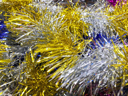 tinsel Colorful shiny vivid ribbon background for Christmas, happy new year.の写真素材