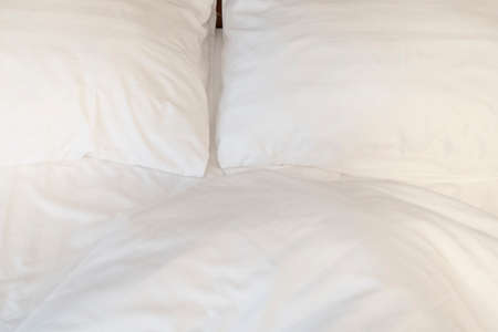 Top view of the crease of an unmade bed sheet in the bedroom after a long night sleep and waking up...