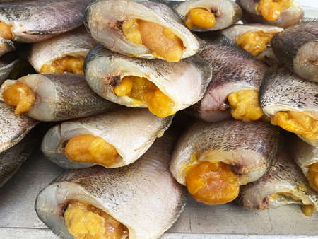 close up drying snakeskin gourami fishes.の写真素材