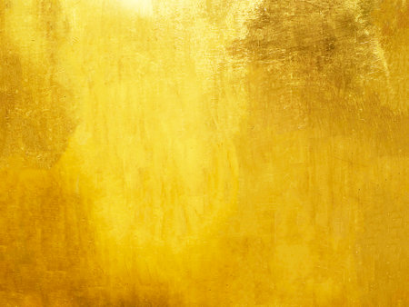 Old glod metal wall background or texture and shadow.の写真素材