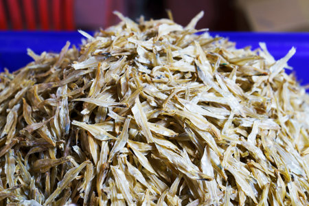 Dried fish by market, Market Dried Fish. Small dried fish in an Asian market.Many of dried Small...