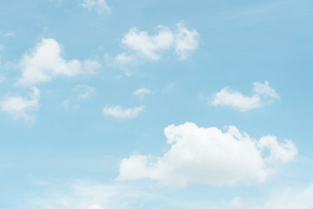 Beautiful clouds during spring time in a Sunny day. Blue sky and white fluffy clouds.の写真素材