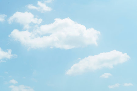 Beautiful clouds during spring time in a Sunny day. Blue sky and white fluffy clouds..