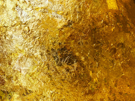 Texture of the gold leaf, Gold background.