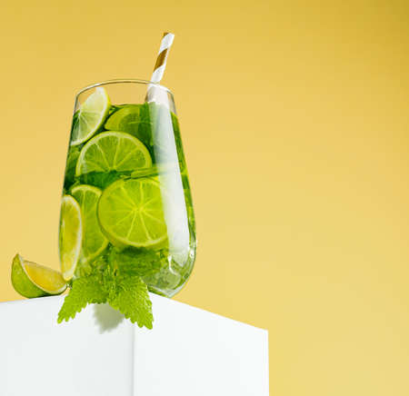 Mojito cocktail on the podium with paper tubesの写真素材