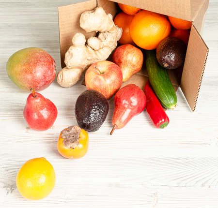 Delivery of fruits and vegetables in a corton box, the box is openの写真素材