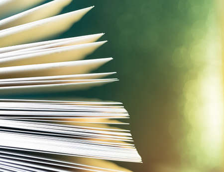 open book with a red ribbon with bokeh effect, macro, fairy taleの写真素材