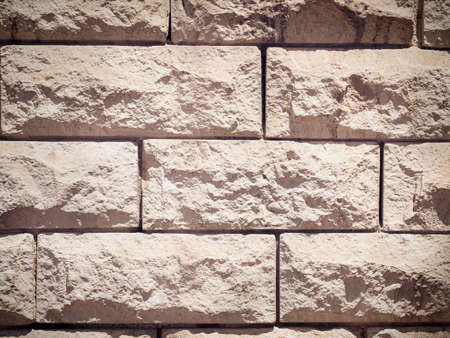 Brick background, white uneven brick masonry, brick wall