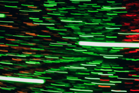 abstract background - long blurry defocused green and red lights