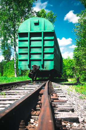 rail freight car on rails in the countrysideの写真素材