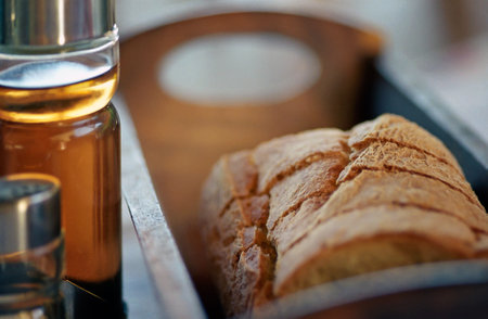 Restaurant set on table - oil, vinegar, bread, close-up. Shallow depth of field