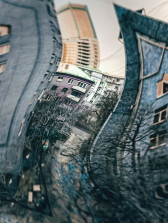 Cityscape in kaleidoscope mirrors, distortions of urban architecture, abstractの写真素材