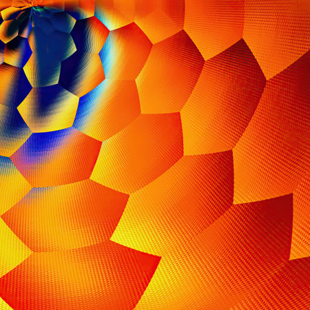 An abstract geometric pattern, featuring a mesmerizing swirl of orange and yellow hues. The pattern is composed of many small, interconnected polygons, creating a sense of depth and movementの写真素材