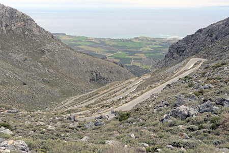 The road from Kallikratis to Kapsodasos, the most hairpinned road of  Crete, Greeceの写真素材