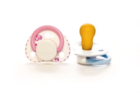 couple  pacifier  on white with soft shadow