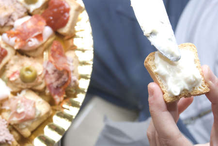 Hands of woman preparing food.の写真素材