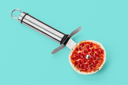 pizza knife. Modern art collage. Salami pepperoni pizza and pizza knife. Modern food concept.