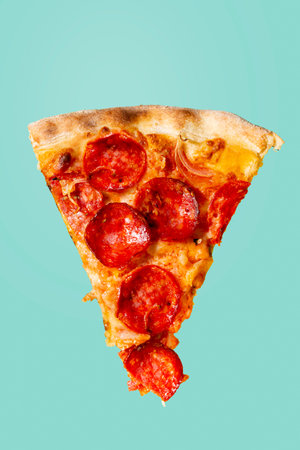 Slice of pepperoni pizza with salami on the background.