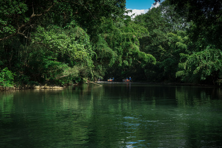 Tourists on the rafts in the riverの写真素材
