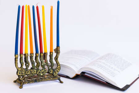 Traditional Jewish Menorah with colored candles