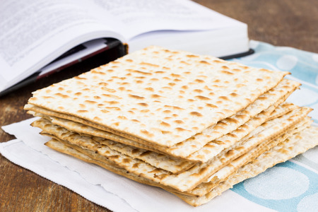 Matzot for passover celebration on a wooden surface