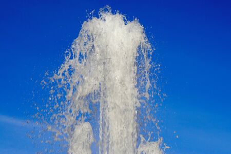 Jet of water in geyser fountainの写真素材