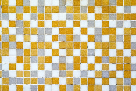 Small mosaic tiles at wall
