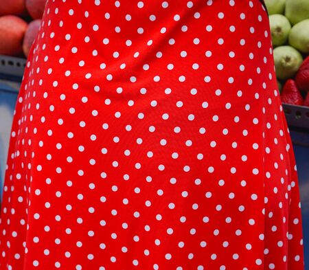 White dots at red textile polka dressの写真素材