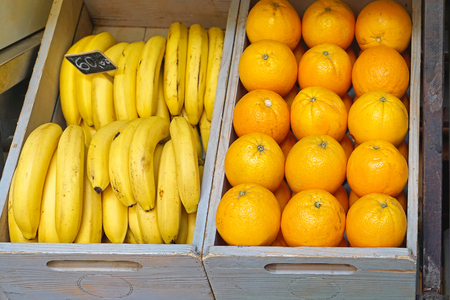 Crates with bananas and oranges fruitsの写真素材