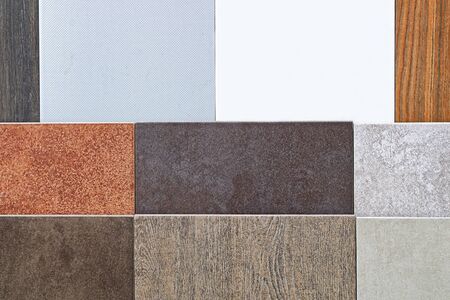 Ceramic tiles in various patterns and earth colorsの写真素材