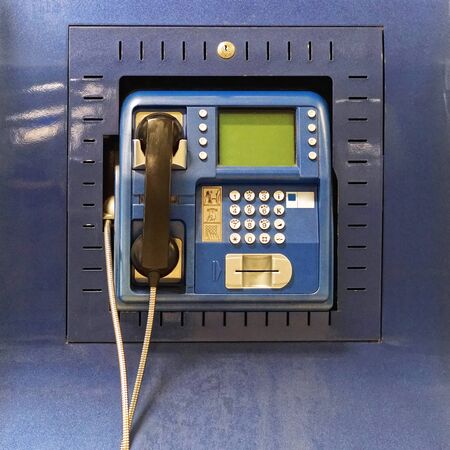 Blue public telephone with big display