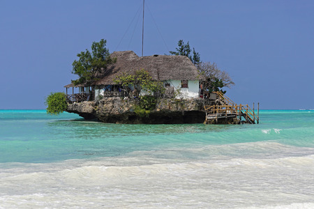 Restaurant on small rock island in Zanzibar Tanzaniaのeditorial素材