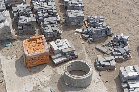Construction site material at pallets outside
