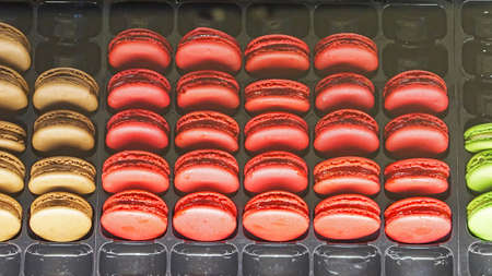 Famous french cuisine macaroons cookies in trays
