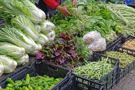 Chinese vegetables at asian marketの写真素材