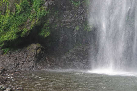 Big natural waterfall in tropical jungle Africaの写真素材