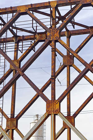 Old rusty stell bridge over river Savaの写真素材