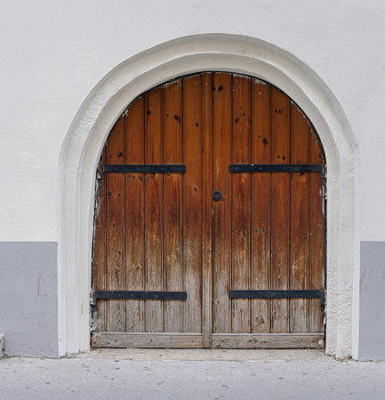 Double wooden door with archの写真素材
