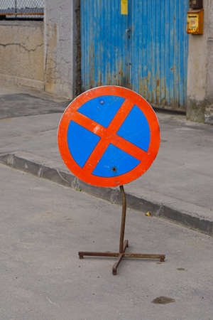 No parking sign at street in front of garageの写真素材