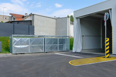 Truck entrance open curtain warehouse building exterior transport