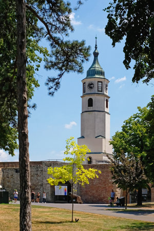 Belgrade, Serbia - July 5, 2021: Old clock Sahat tower landmark at Kalemegdan park fortress hot summer day.のeditorial素材