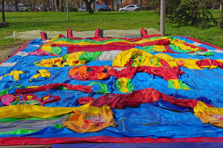 Belgrade, Serbia - April 4, 2018: Deflated air bouncy castle dream land kids playground fun ride at New Belgrade.のeditorial素材