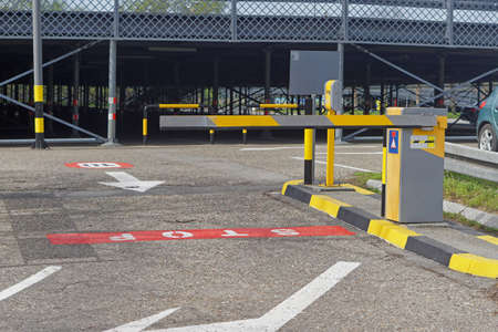 Parking barrier control ramp boom down exit