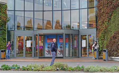 Belgrade, Serbia - October 8, 2020: Revolving door entrance to Ada shopping mall building.