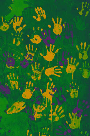 Colored handprints on the wall