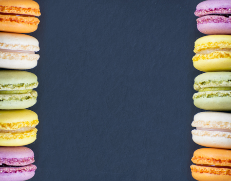 Colorful macaroons on stone table.の写真素材